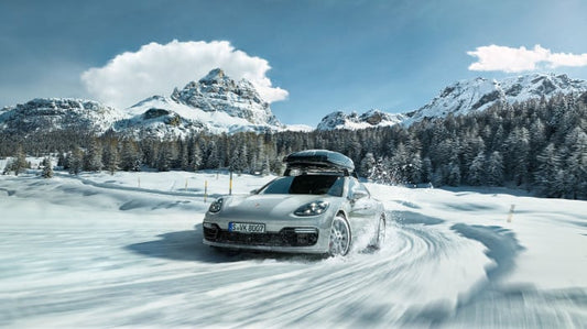 Porsche driving in snow